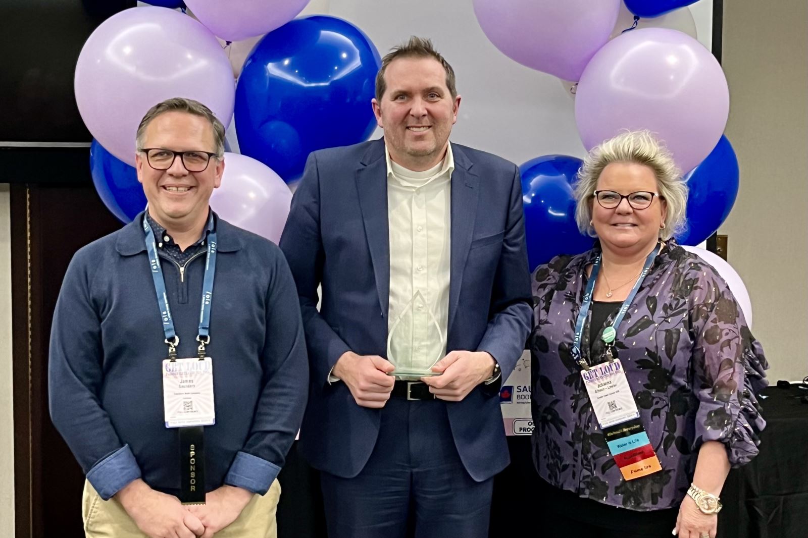 OSLA School Administrator of the Year Winner Peter Rewega (middle) with OSLA President Johanna Gibson Lawler and James Saunders