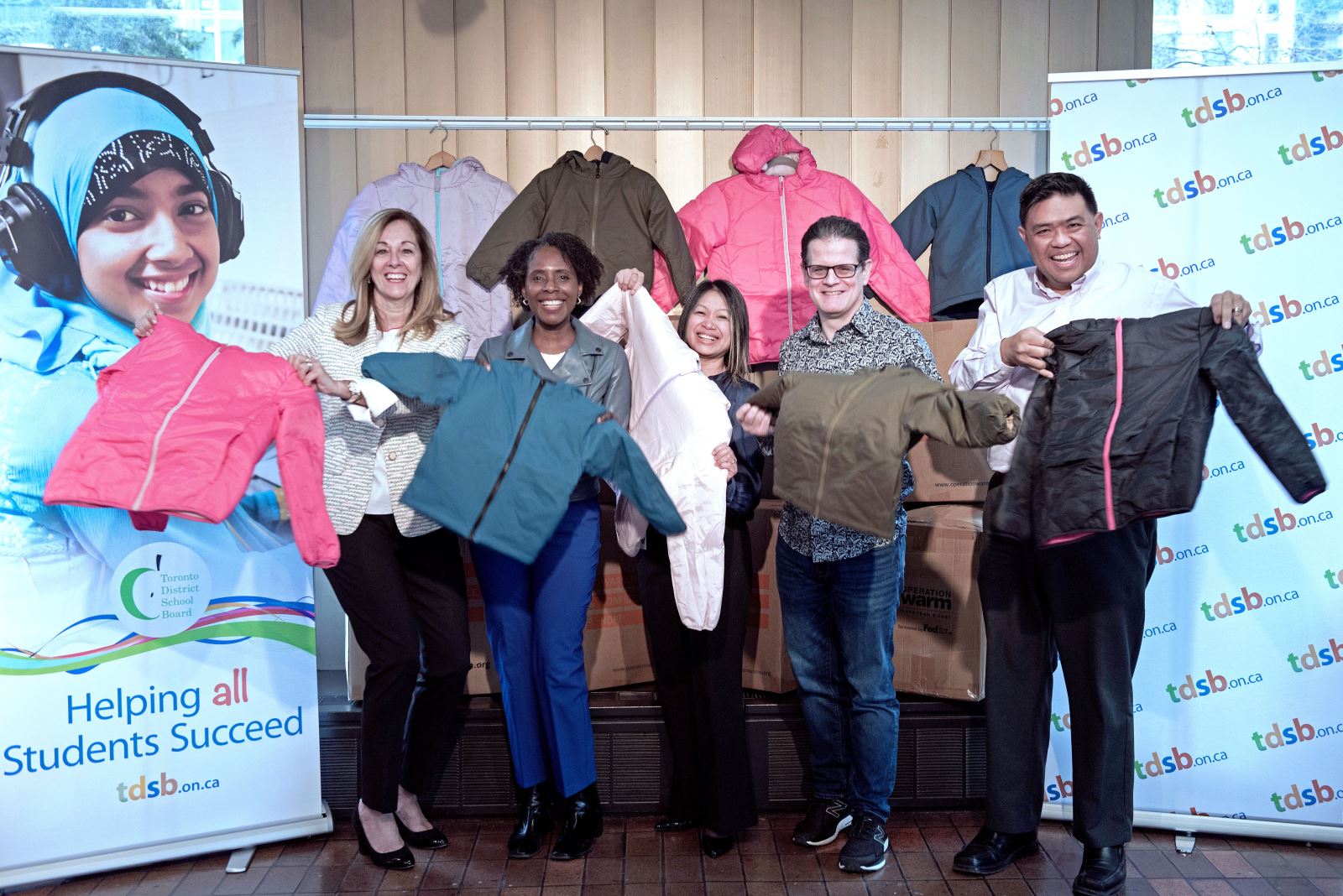 From L-R:  Pina Starnino (Board of Director, Operation Warm), TDSB Director Colleen Russell-Rawlins, Lily Szeto (Manager, TDSB Educational and Business Partnerships), Garry Green (Sr. Manager, TDSB Business, Community Services and Student Transportation Services), Karlo Cabrera (TDSB Centrally Assigned Principal, Model Schools for Inner Cities)