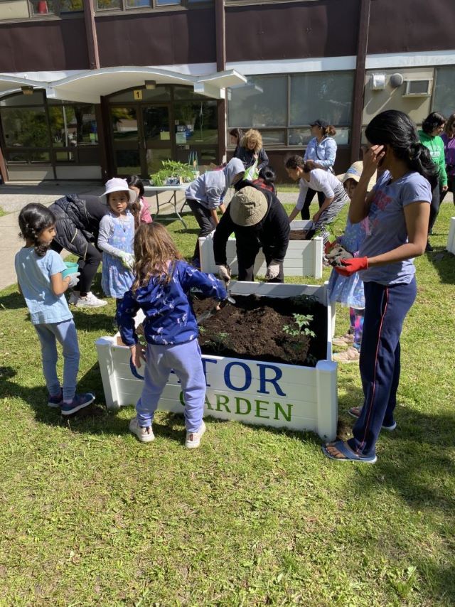 People are planting. Open Gallery