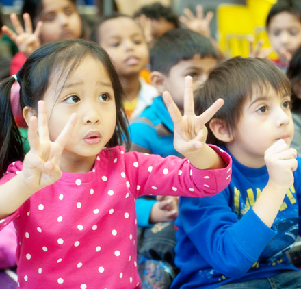 Young children engaged in early learning