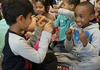 Students playing toys