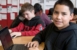 Students in class working on computers