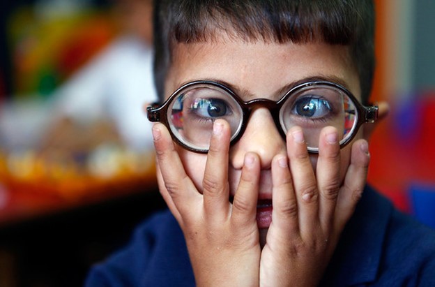 Child Wearing Glasses