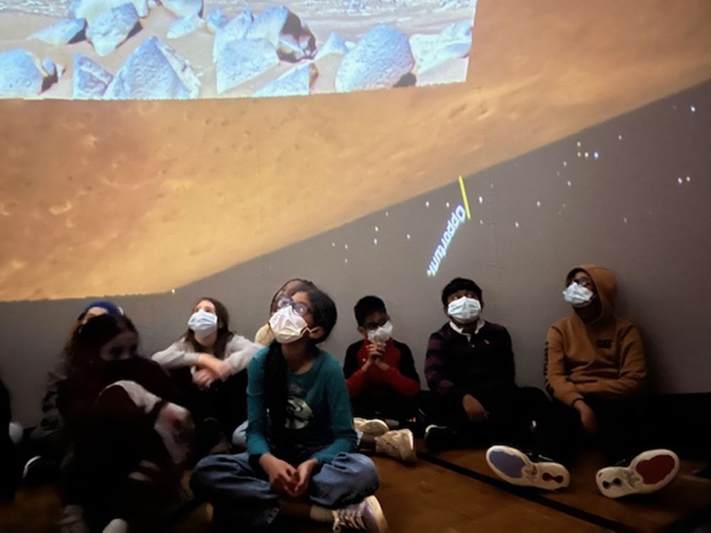 Students wearing masks participating in Canadian Space Resource Centre activity